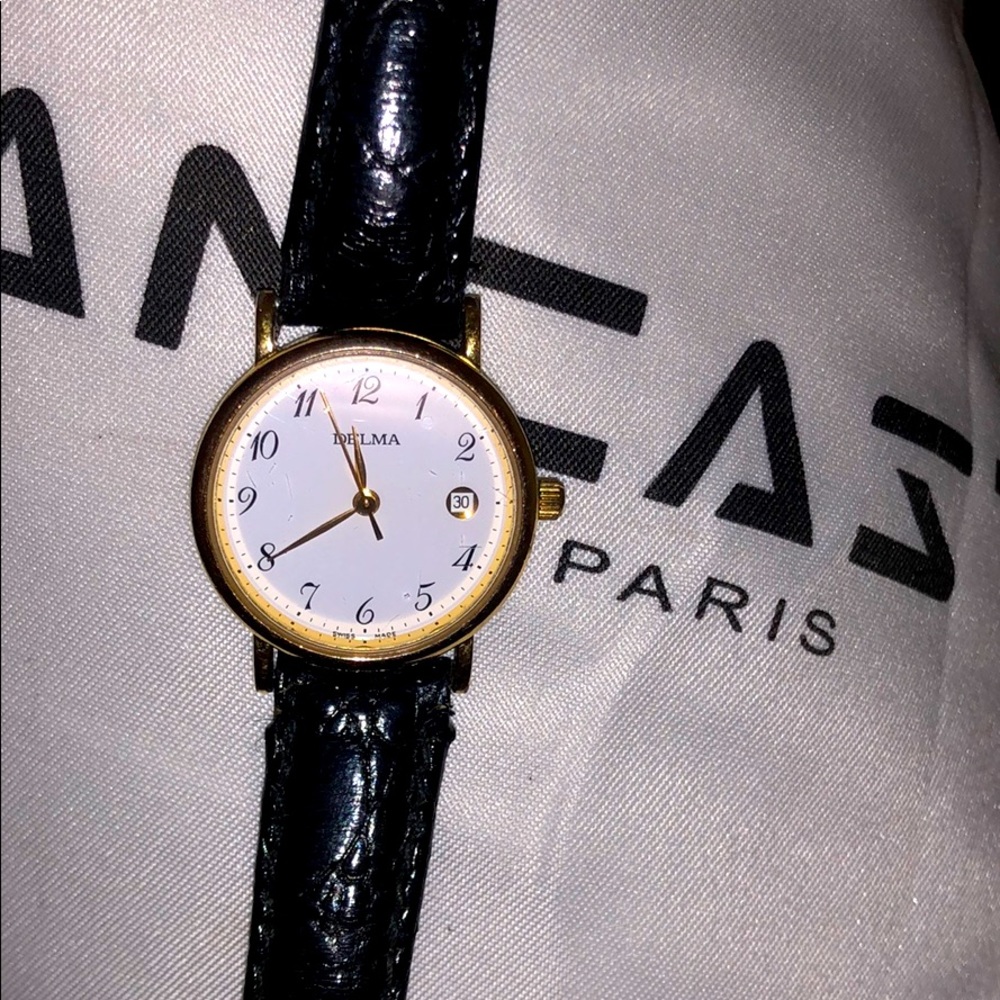 BRAND NEW DELMA SWISS 18kT gold leather watch